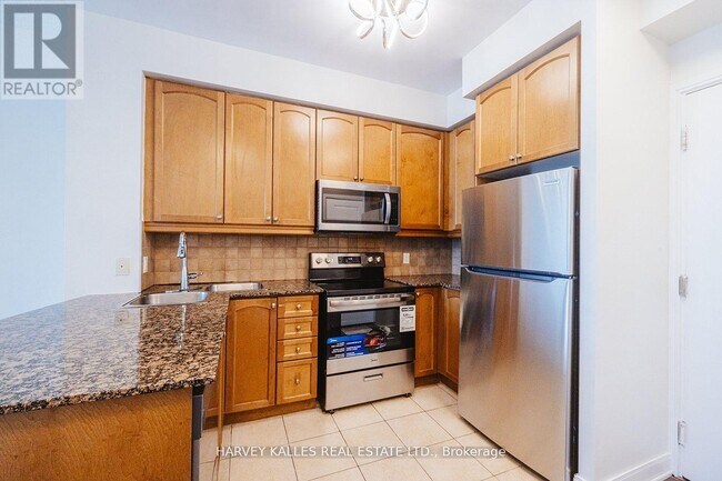 Photo du bâtiment - 80 Absolute Ave