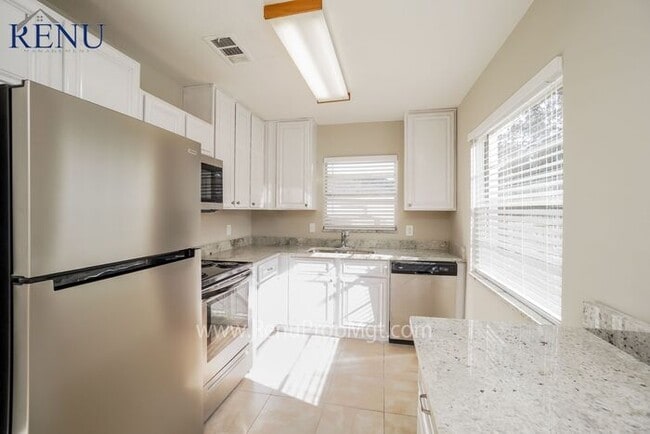 Building Photo - SPECIAL: $0 Application Fee. 50% off the f...