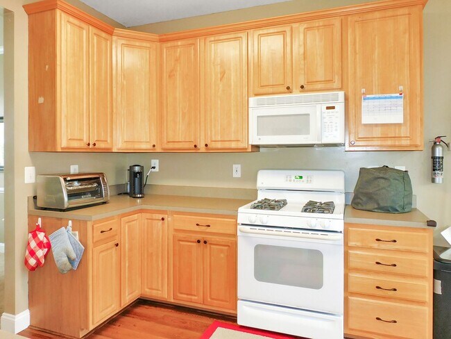Building Photo - Colonial with Finished Basement and 2 Car ...