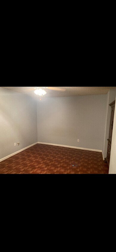 Large master bedroom connected to bathroom. - 1541 Live Oak St