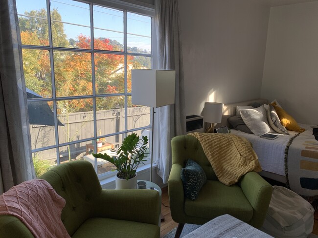 Bring your garden and the sunshine inside as you relax in front of a huge, vintage, paned wood windo - 1607 Talmadge St