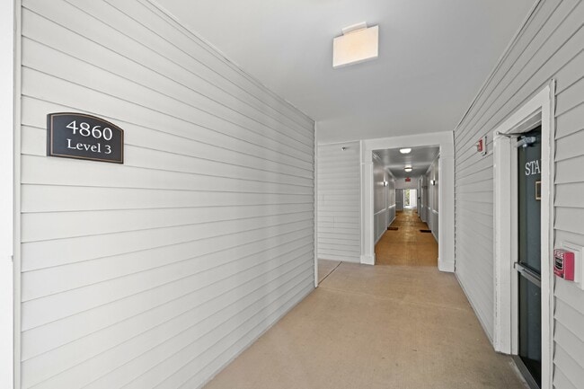 Photo - Two-bedroom, two-bathroom model with a den, located on the third floor. Apartment
