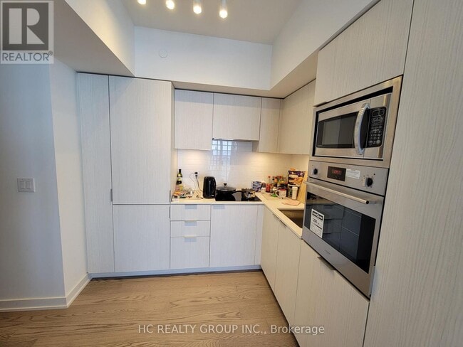 Building Photo - 11 Wellesley St W