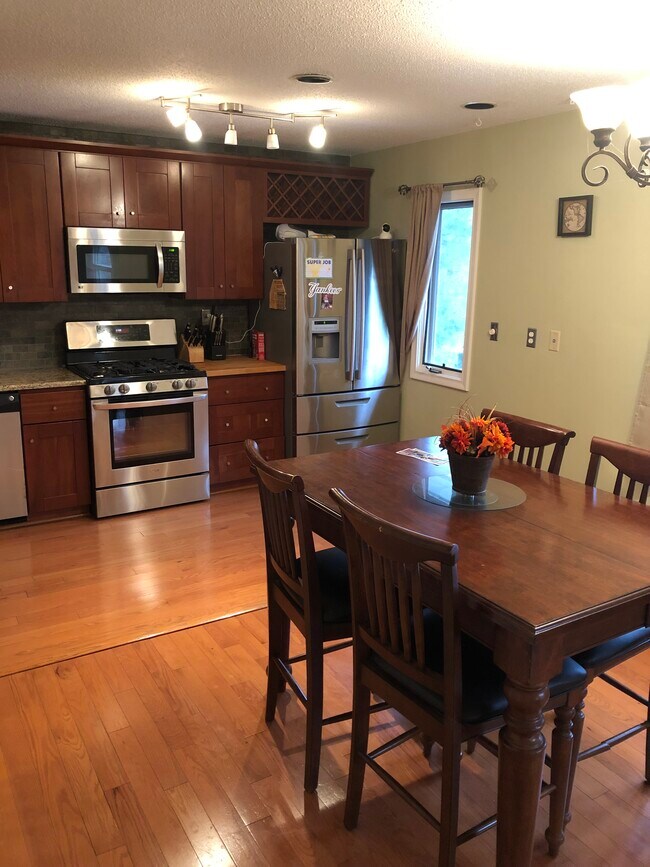 Dine in kitchen. Main level half bath - 56 Uplands Way