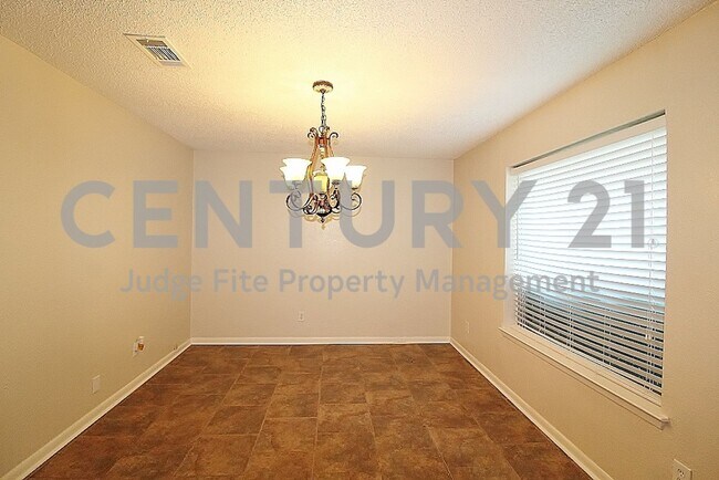Building Photo - Wonderful 4/2/2 Nestled on Nicely Landscap...