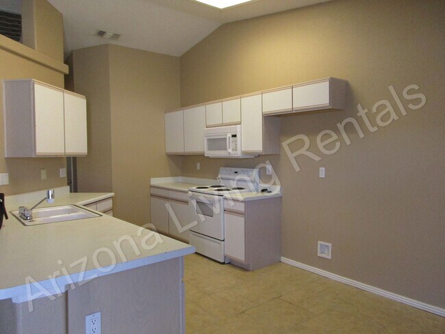 Building Photo - FANTASTIC NORTHSIDE 3 CAR GARAGE HOME