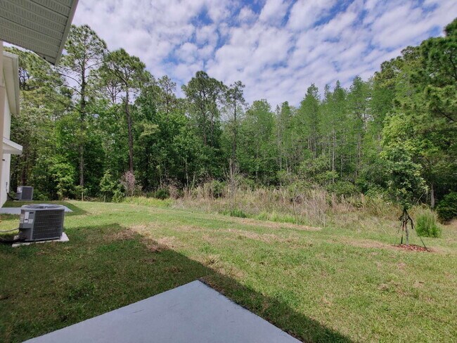 Foto del edificio - 7527 Cypress Walk Dr