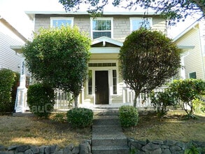 Building Photo - 5605 NE Caddis Dr