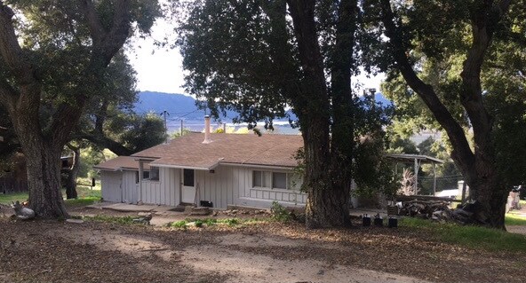 Nestled among the oaks with a lake view. - 28515 Highway 79