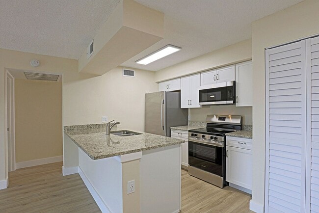 Building Photo - Mystic Gardens 5331-3114