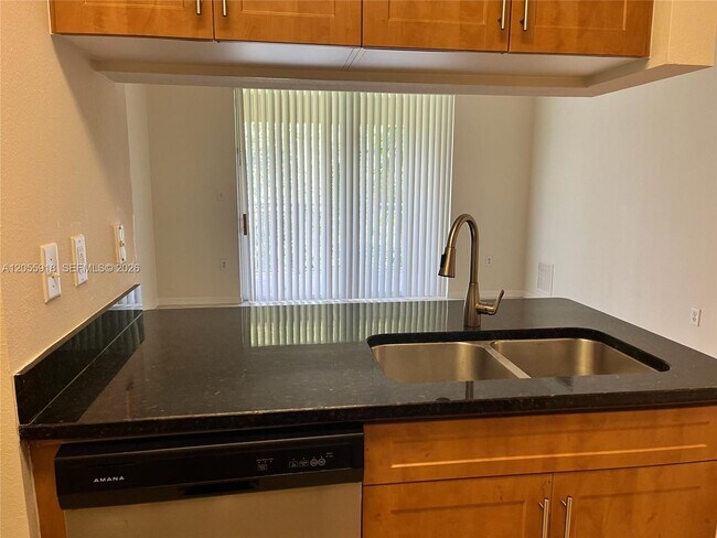 Building Photo - 6492 Emerald Dunes Dr