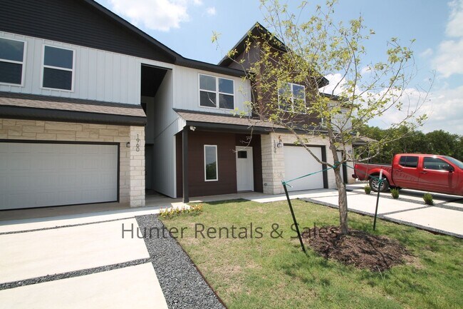 Building Photo - 2 Weeks Free!!!  Upscale Three-bedroom Tow...