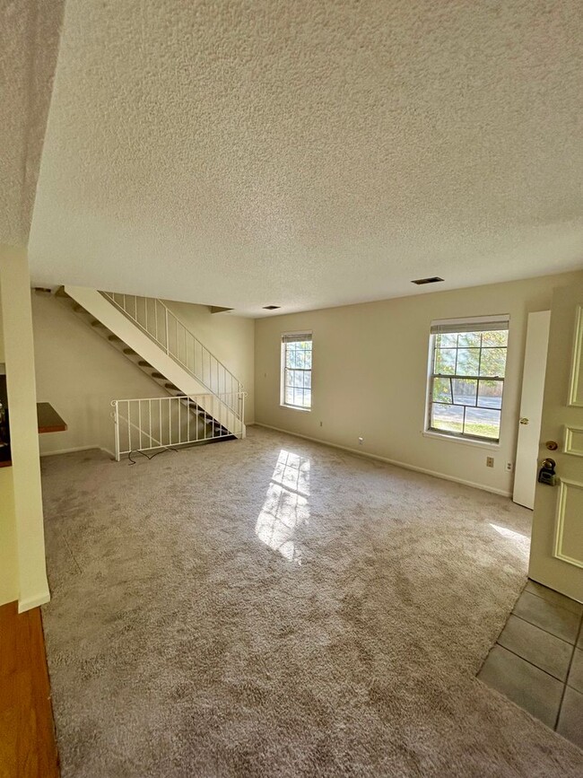 Building Photo - Charming 2 Bed, 2 Bath Home with Finished ...