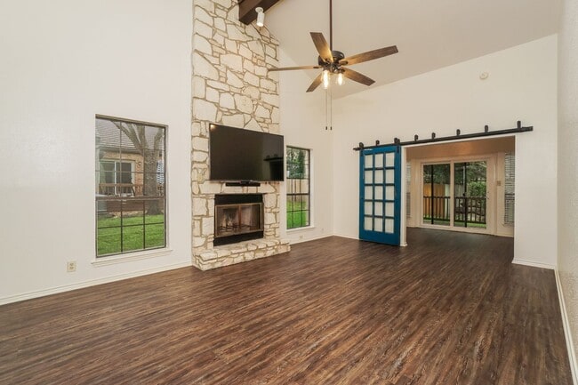 Building Photo - Charming 2-Bedroom Condo in Gated Community Surrounded by Mature Trees