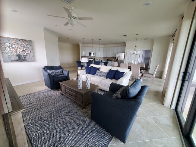 Un gimnasio bien equipado para ayudarte a mantenerte activo y en forma. - 11781 Grand Belvedere Way