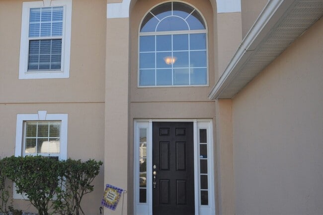 Building Photo - Rare find! Sutton Lakes 5 bedroom on seren...