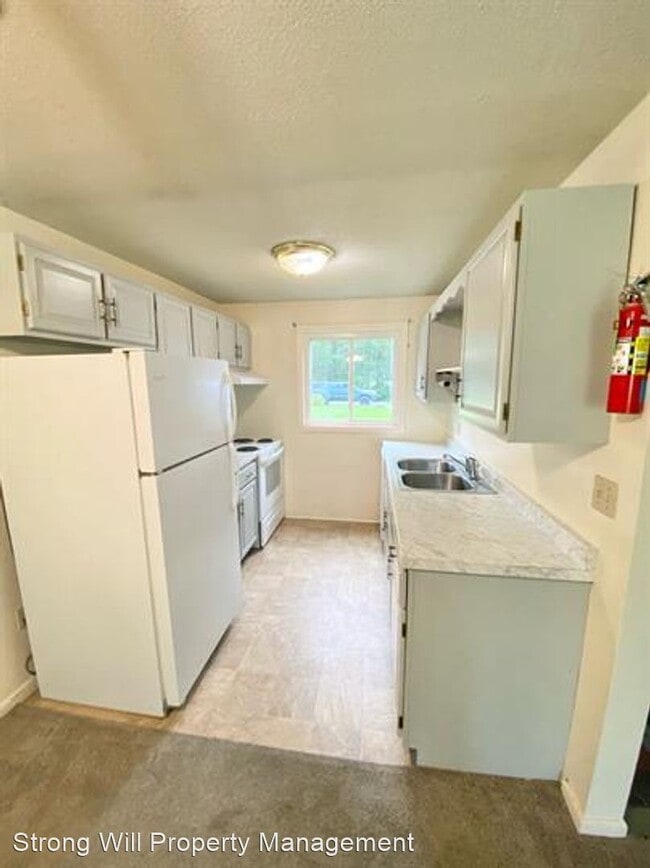 Building Photo - 2 br, 1.5 bath House - 8 Timber Lane - Uni...