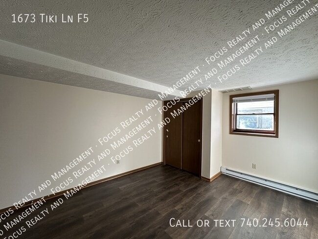 Building Photo - 1673 Tiki Ln