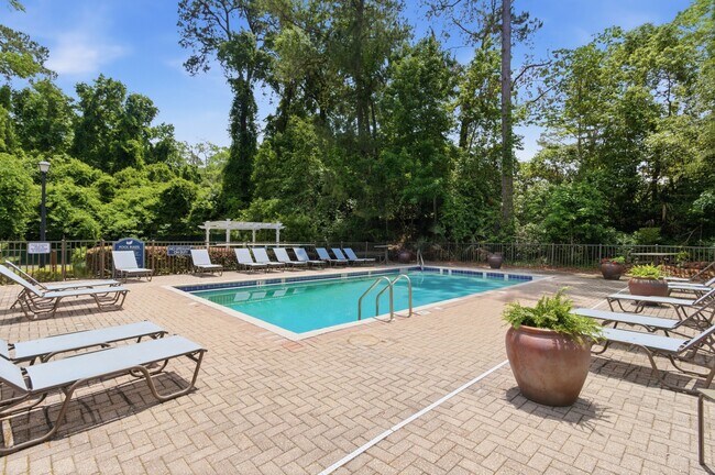 Soak up the Florida sun poolside at Aspen Run, where relaxation is always just steps from home. - Aspen Run I and II
