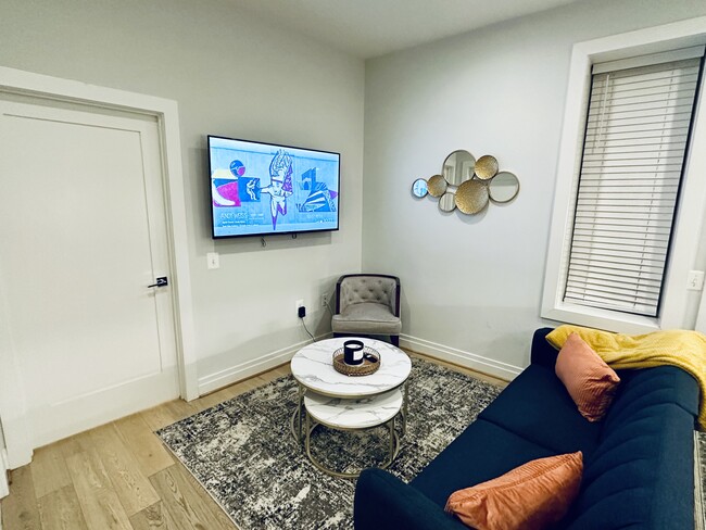 Living room, high speed Wi-Fi, sleeper sofa - 7101 Georgia Ave NW