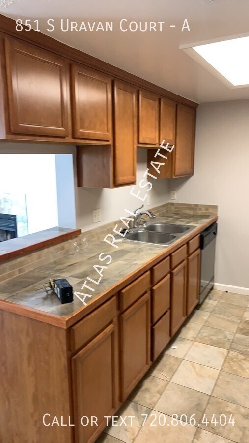 Building Photo - BEAUTIFUL 2 BED CONDO with GARAGE! NEAR BU...