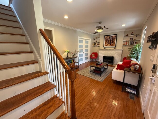 Living room and staircase to second floor - 5715 7th St N