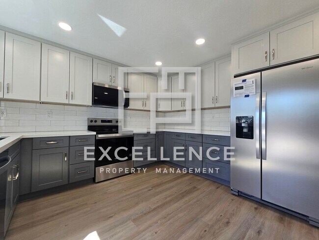 Building Photo - All Newly Remodeled Throughout Home With Huge Yard