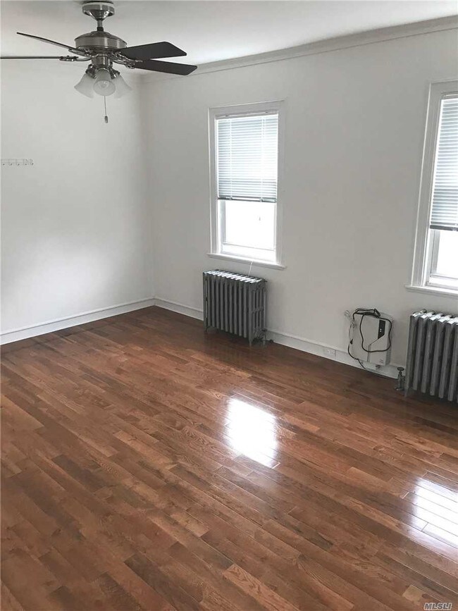 Building Photo - 119-40 7th Ave