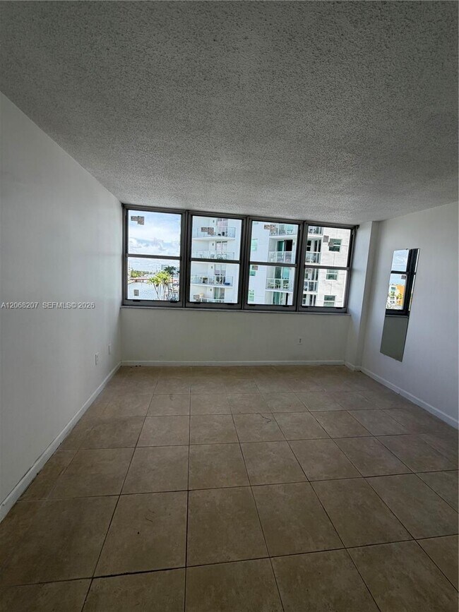 Building Photo - 5838 Collins Ave