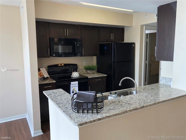 Foto del edificio - 1 br, 1 bath  - 1510 NW 128th Dr Apt 305