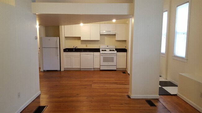 kitchen with dishwasher, stove, hood and refrigerator - 165 Nicoll St