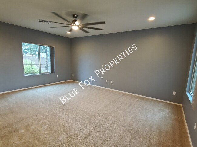 Building Photo - 10947 E Passion Flower Ln