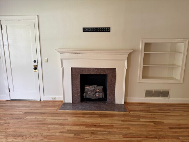 Fireplace and in set bookshelf - 1520 Hilton Ave