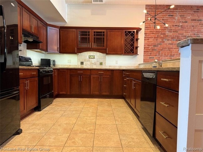 Foto del edificio - 107 W Grand River Ave