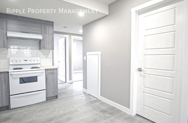 Photo du bâtiment - COZY 2-BED BASEMENT | MODERN COMFORT | MARTINDALE PARK