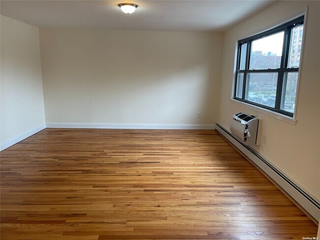 Building Photo - 201-24 43rd Ave