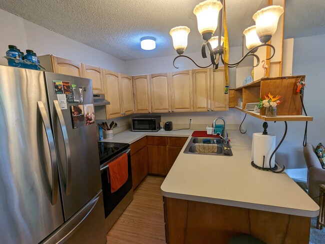 kitchen lots of cupboards and drawers - 360 Kauila St