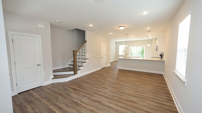 Building Photo - Brand New, End Unit Townhome Close to Down...