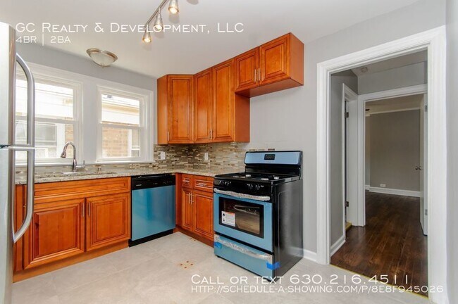 Building Photo - 548 E 103rd Pl