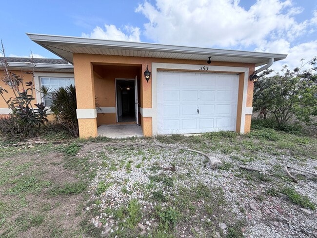 Building Photo - 3/2 Duplex in Lehigh $500.00 OFF FIRST MONTH!!!!