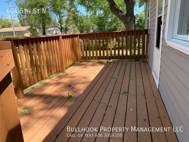 Building Photo - Beautifully updated house with 2 decks and...