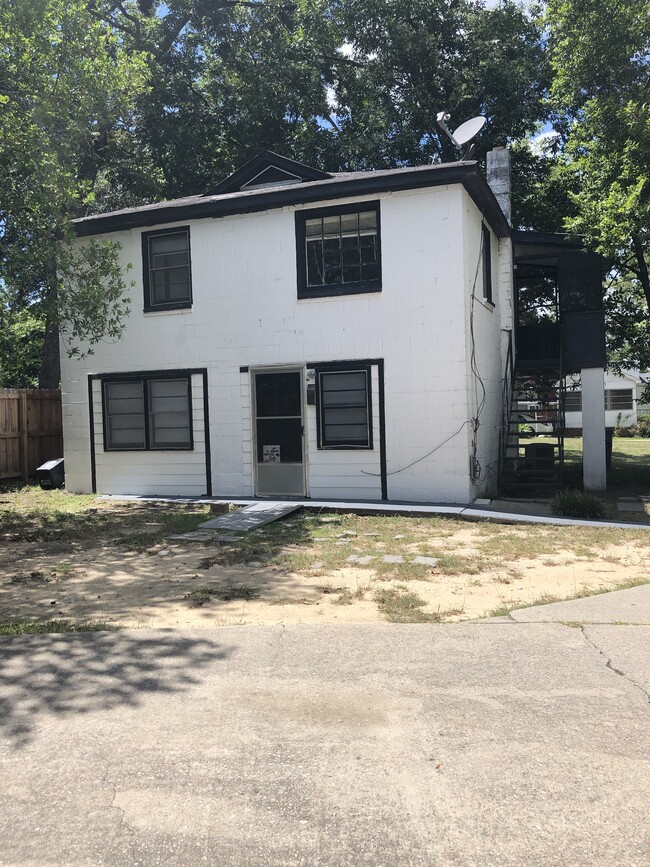 Private 2 story home at back of property. Freshly painted with new flooring throughout. - 4811 N Main St