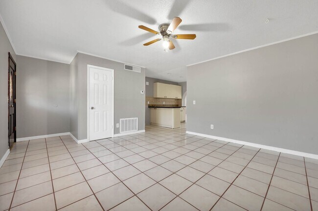 Building Photo - 3/1.5/1 Home with HUGE fenced yard!