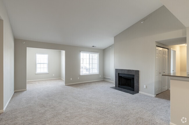 1BR, 1BA - 900SF - Árbol - Sala de estar - The Villas at Main Street