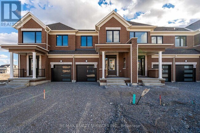 Photo du bâtiment - 123 Sanderson Dr