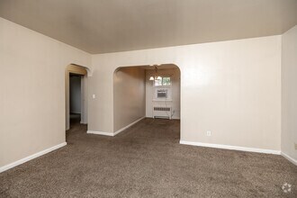 2BR, 1BA - 713 SF - Living Room - Franklin Court Apartments