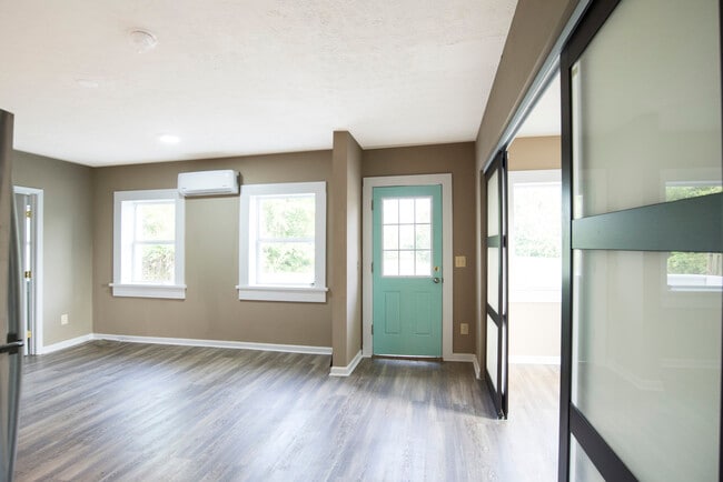 large windows, open floor plan. - 15010 Point Lookout Rd
