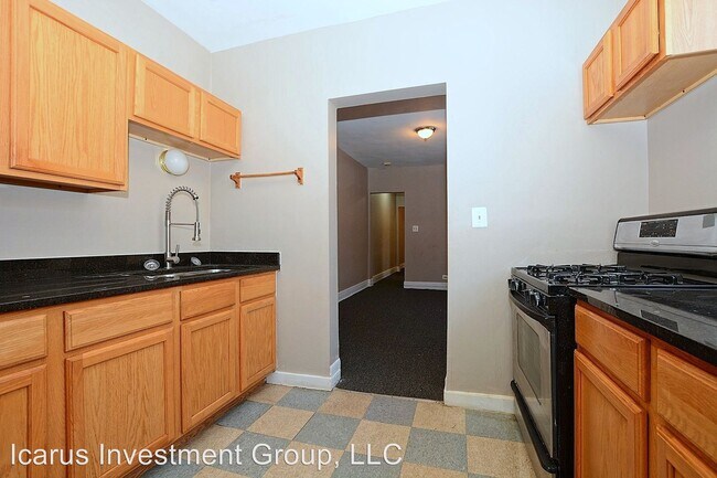 Foto del edificio - 7001-7007 S Merrill Ave