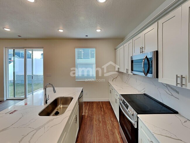 Foto del edificio - 13947 E 101st Ave