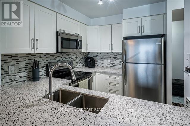 Photo du bâtiment - 2177-2177 Burnhamthorpe Rd W